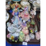 A collection of figures including Paragon, Royal Doulton, Dresden and others Condition Report:Not