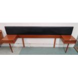 A mid 20th century Austin suite stained teak and black vinyl head board with flanking single