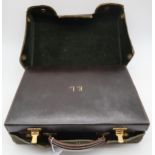 A LEATHER VANITY CASE monogrammed E.L and three fountain pens and a pencil (5) Condition Report: