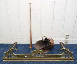 An early 20th century brass fire fender, copper coal hod and a copper hunting horn (3) Condition