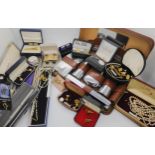 A leather bound vintage gents travelling grooming set, cufflinks, tie clips and other items