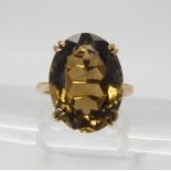 A 9ct gold smokey quartz ring, size K1/2, weight 6.3gms Condition Report:Available upon request