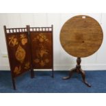A Victorian mahogany circular tilt top table on tripod base and a mahogany inlaid two tier screen (