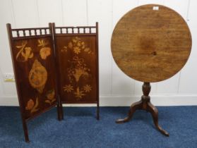 A Victorian mahogany circular tilt top table on tripod base and a mahogany inlaid two tier screen (