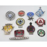 A QUANTITY OF CAR BADGES comprising;AA, and others Condition Report:Available upon request