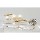 A 14k gold Mikimoto three pearl ring with the Mikimoto stamped logo, finger size L, weight 2.7gms