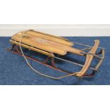 A 20th century beech and wrought iron "Flexible Flyer" sled Condition Report:Available upon request