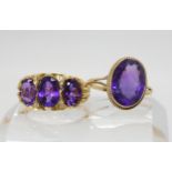An 18ct gold amethyst and diamond traditional scroll mounted ring, size R, weight 8.7gms, together