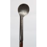 A RARE HAND FORGED SPOON HEAD IRON hickory shaft, 101cm long Condition Report:Available upon