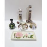 A Royal Crown Derby frog paperweight, cup and saucer, a Moorcroft magnolia trinket dish and small