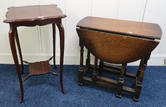 A 20th century mahogany two tier occasional table and a stained oak drop leaf occasional table (2)