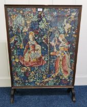 A 20th century tapestry fire screen, 97cm high x 68cm wide Condition Report:Available upon request