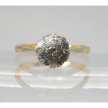 An 18ct gold vintage diamond flower ring, size K, weight 2.3gms Condition Report:Available upon