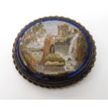 An (af) micro mosaic brooch depicting roman ruins Condition Report:Pin missing and the blue edge has