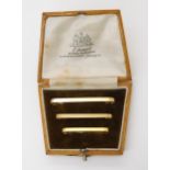A set of three 15ct gold tie pins of different sizes in the original fitted box, weight of the