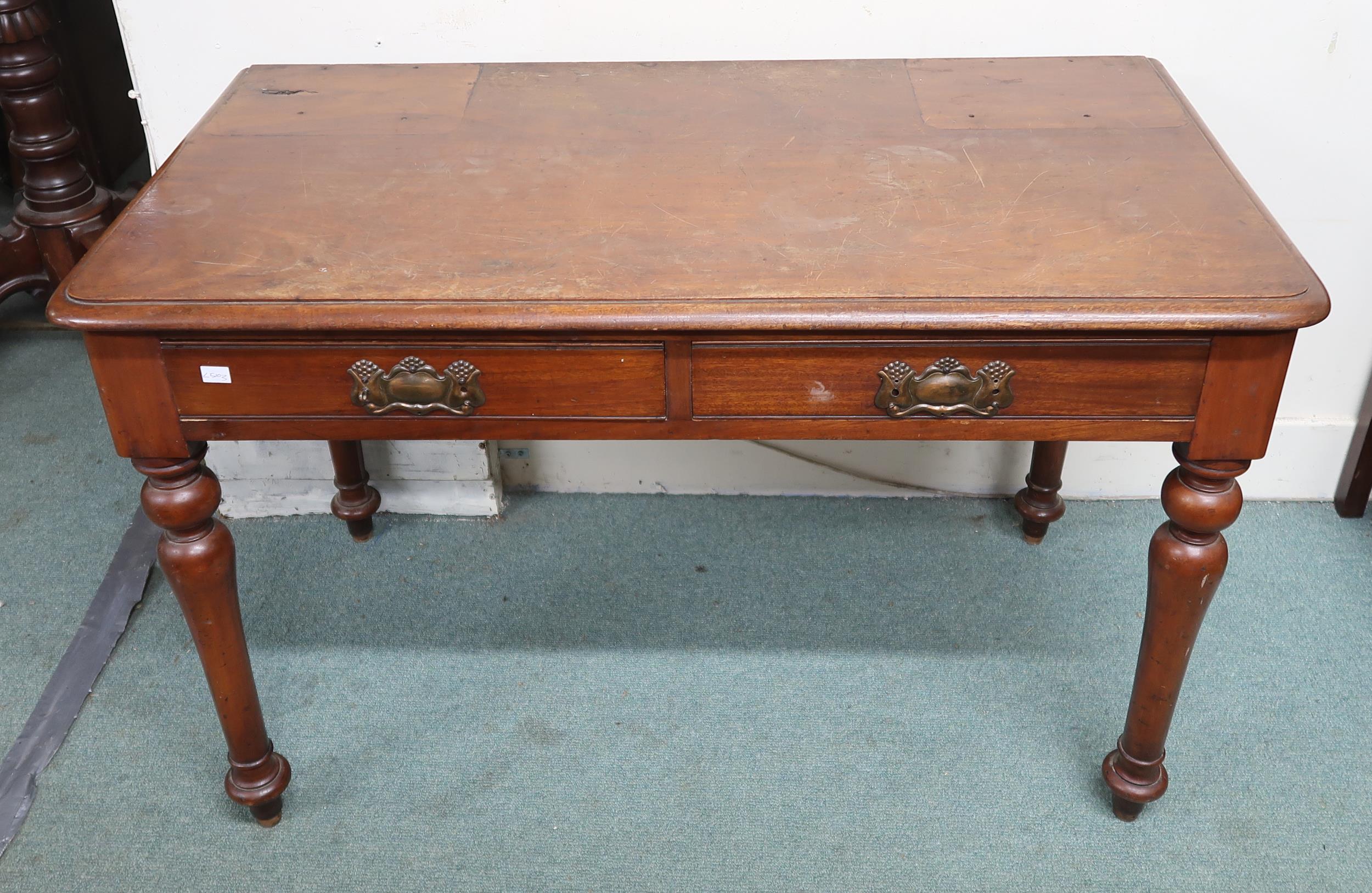 A Victorian mahogany two drawer dressing table, Victorian balloon back chair and a bergere chair