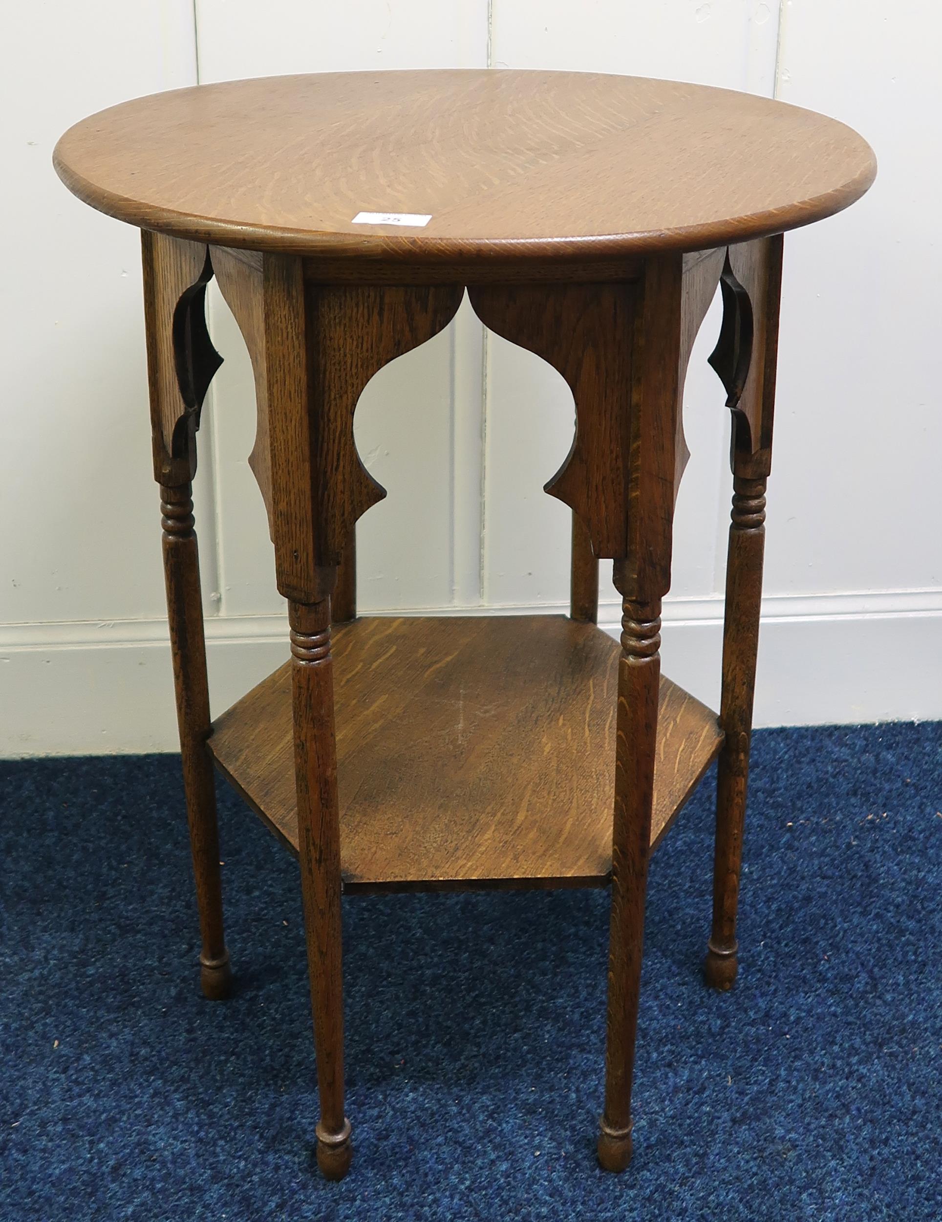 An early 20th century beech Liberty's style circular top table on hexagonal base Condition Report: