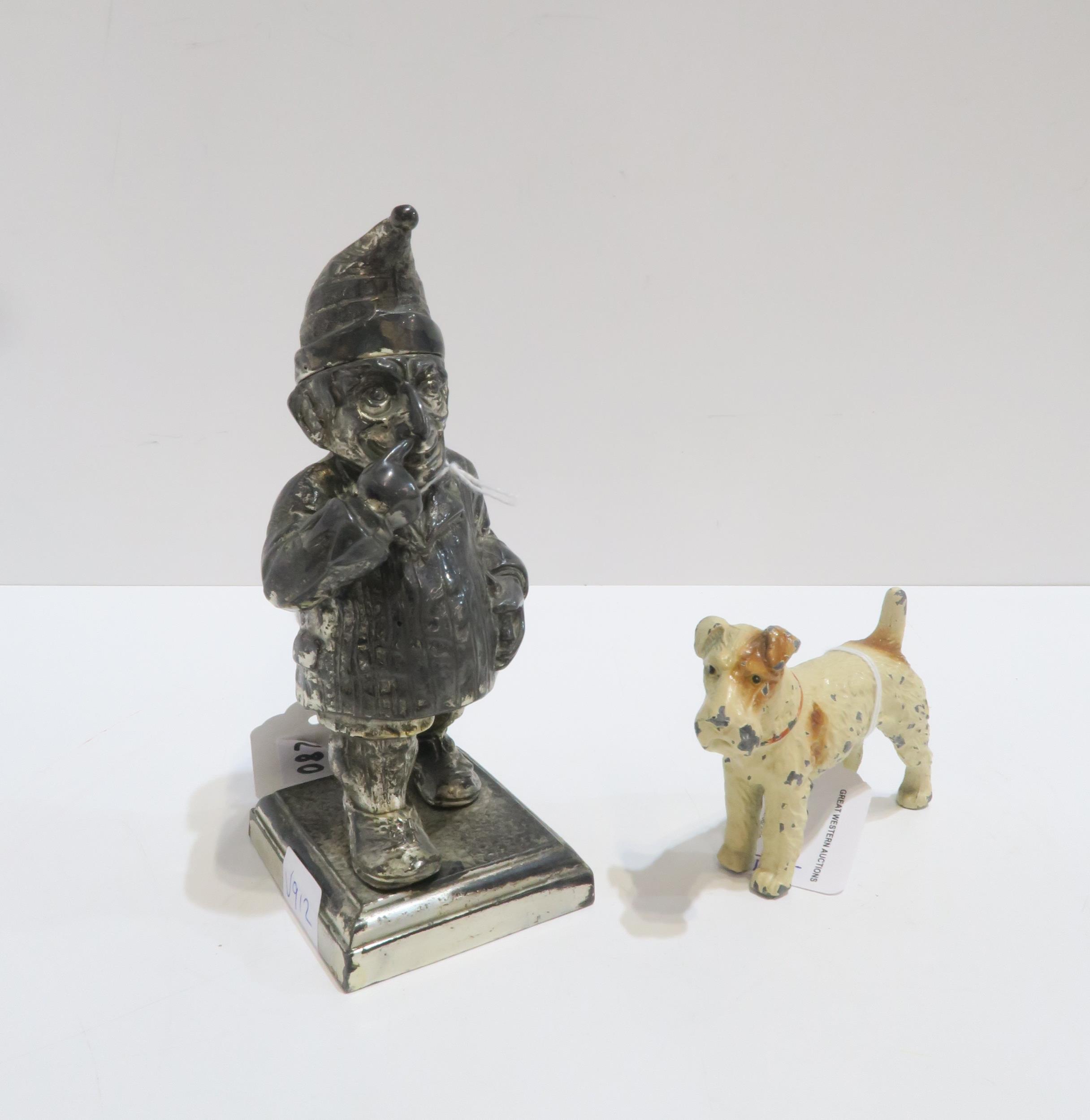 A Mr Punch table lighter, registered design number 782230 and a painted spelter figure of an