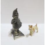 A Mr Punch table lighter, registered design number 782230 and a painted spelter figure of an