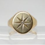 A gents 9ct gold diamond set star signet ring, size V1/2, weight 11.4gms Condition Report: