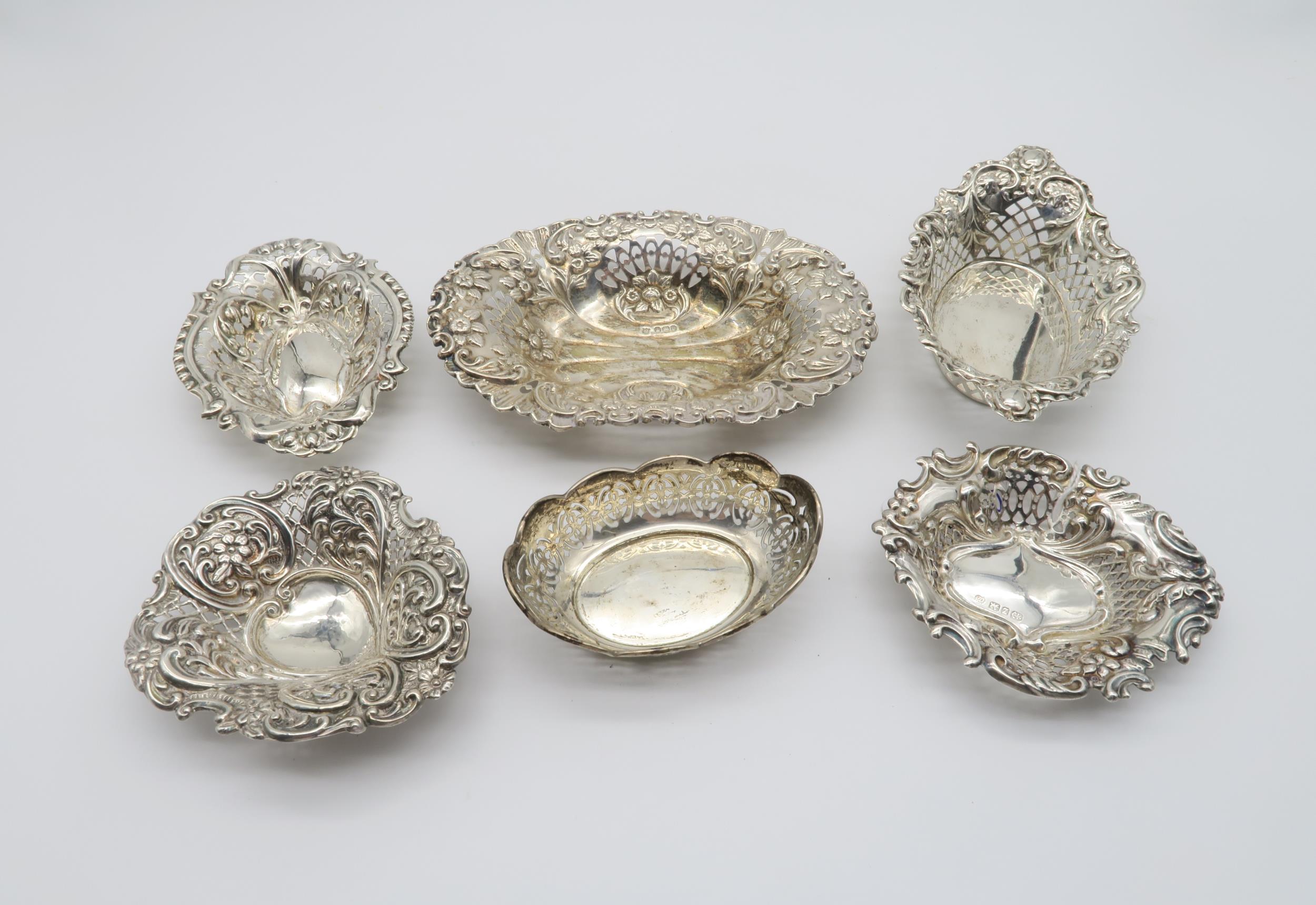 A collection of various silver bon bon dishes / trinket dishes, all with pierced decoration, various