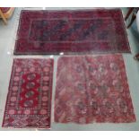 A lot of two small Bokhara rugs and another Persian rug (3) Condition Report:Available upon request