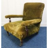 A Victorian mahogany framed  armchair upholstered in green velvet, stamped "J, Mills" to rear