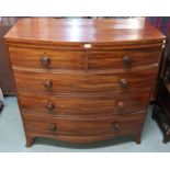 A Victorian mahogany bowfront two over three chest of drawers with turned handles, 105cm high x