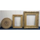 A lot of two 19th century gilt gesso picture frames and a gilt gesso ceiling rose (3) Condition