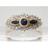 A 9ct gold sapphire and diamond cluster ring, size N1/2, weight 3.3gms Condition Report:Available