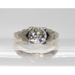 AN 18CT OLD CUT DIAMOND RING with white gold leaf design shoulders the approximate dimensions of the