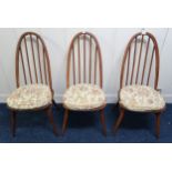 A lot of three mid 20th century elm and beech Ercol rail back chairs (3) Condition Report: