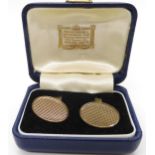 A pair of 9ct gold fixed 'T'bar cufflinks in original box from The Goldsmiths & Silversmiths Assn.
