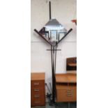 A mid 20th century wrought iron wall mounted mirror, pair of sconces and a studio glass ceiling