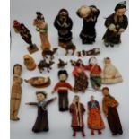 A lot comprising two Norah Welling dolls, various wooden dolls in ethnic dress, Matryoshka style