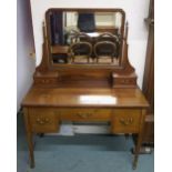 A late Victorian mahogany mirror backed dressing table on square tapering supports Condition