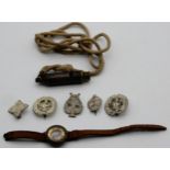 A leather strapped (def) wrist worn compass together with various Boy's Brigade badges and a Boy