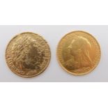 A late Victorian half sovereign 1894, 4 grams together with a gilt coin Condition Report:Available