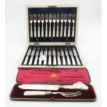 A cased set of silver collared, EPNS bladed and mother of pearl handled fruit knives and forks,