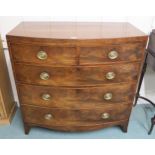 A Victorian mahogany bow front two over three chest of drawers, 102cm high x 105cm wide x 52cm