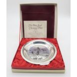 A John Pinches silver Christmas Plate, by Peter Scott, etched with ducks flying over a river, with