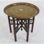 A 20th century eastern brass topped folding occasional table, Edwardian mahogany corner chair and