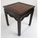 A 19TH CENTURY CHINESE HARDWOOD OCCASIONAL TABLE, with carved fretwork friezes on shaped supports,