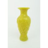 A PEKING GLASS YELLOW GROUND VASE decorated with birds in flowering branches, 21cm high Condition