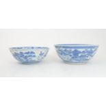 A CHINESE BLUE AND WHITE PUNCH BOWL  painted pagodas on islands, 30cm diameter and another painted