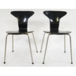 A PAIR OF MID 20TH CENTURY ARNE JACOBSEN FOR FRITZ HANSEN "MOSQUITO" CHAIRS with black laminate