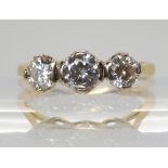 AN 18CT GOLD THREE STONE DIAMOND RING set with estimated approx 1ct of brilliant cut diamonds.