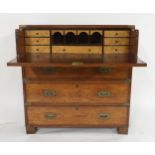 AN EARLY 20TH CENTURY TEAK AND BRASS BOUND SECRETAIRE CAMPAIGN CHEST, with fitted fall front