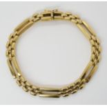 A FANCY LINK BRACELET stamped 750 for 18ct gold to the clasp, length 19cm, weight 17gms Condition