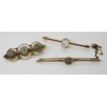 THREE VINTAGE BROOCHES a 9ct gold moonstone bar brooch, moonstone approx 9mm x 7.6mm, length 5cm,